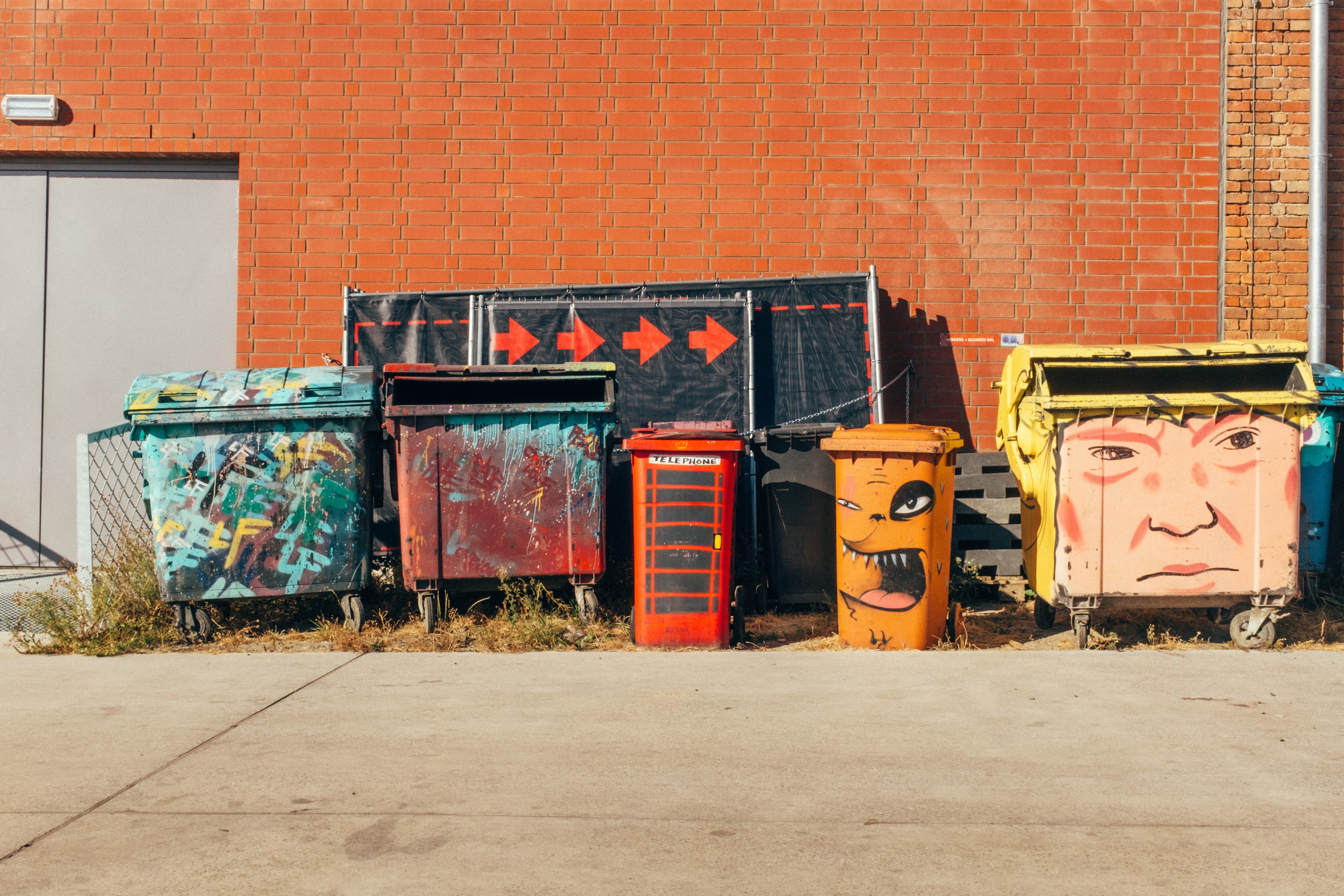 A photo of a collection of dumpsters